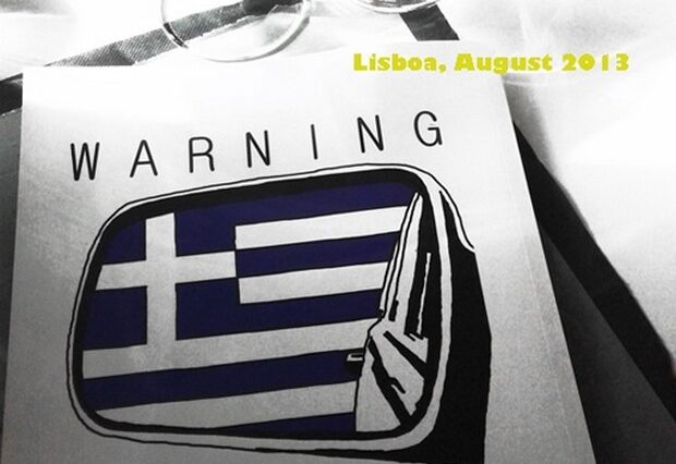 Ο κίνδυνος της Ελλάδας: Προειδοποίηση με την ελληνική σημαία σε εξώφυλλο πορτογαλικού περιοδικού