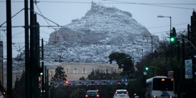 Φωτογραφίες: Το χιονισμένο κέντρο της Αθήνας