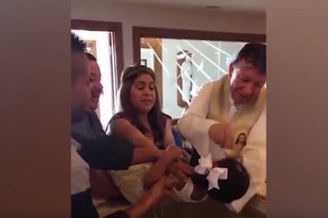Βίντεο: Νευριασμένη 3χρονη βρίζει ασταμάτητα τον ιερέα που την βαπτίζει