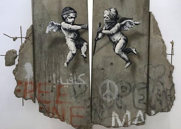 Ο Banksy μοίραζε δωρεάν αφίσες του αλλά η ταυτότητά του έμεινε κρυφή