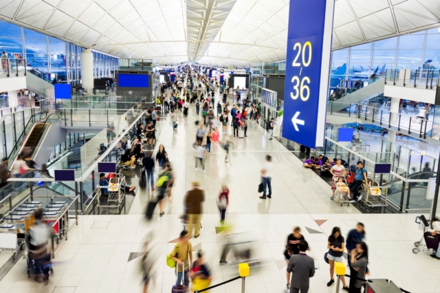 Blurred people walking in airport