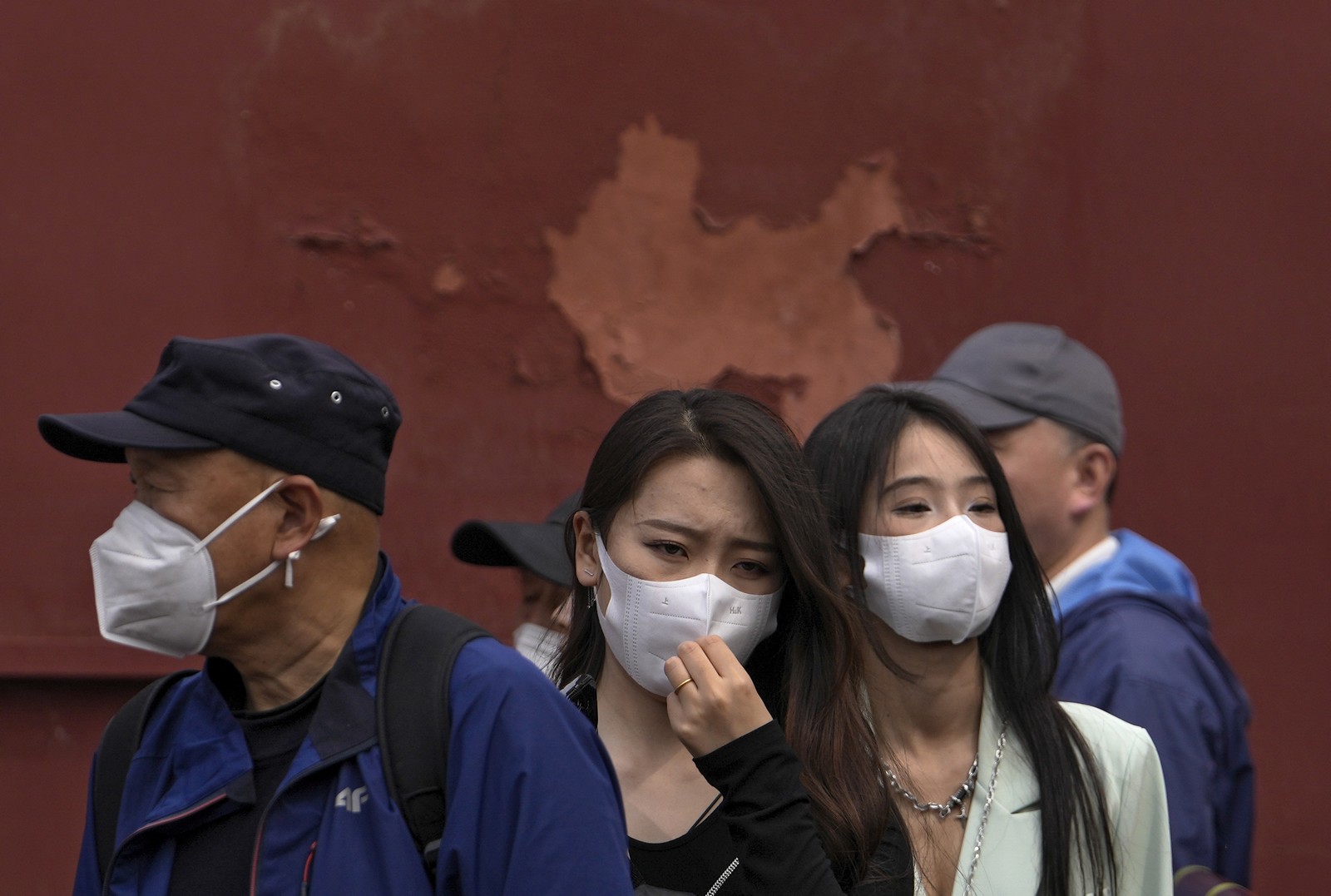 Κινέζοι πολίτες με μάσκες