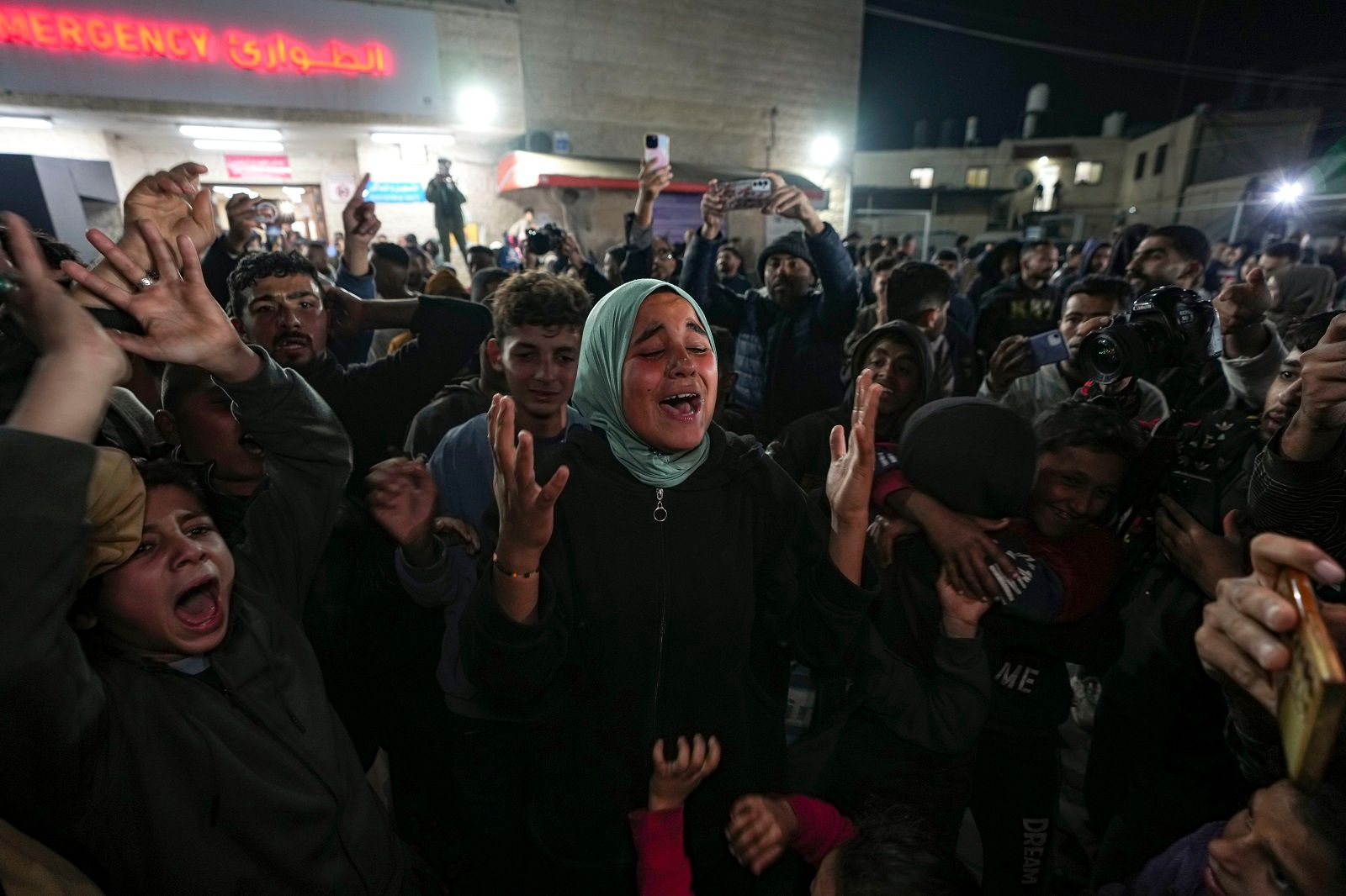 a group of people standing in a crowd