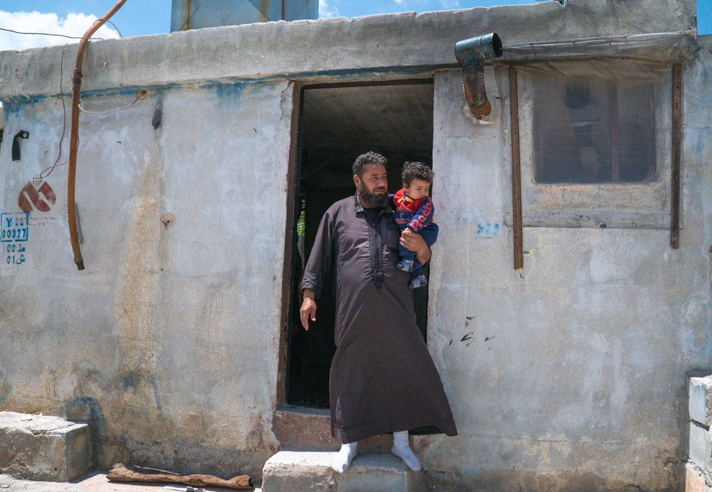 Η οικογένεια του Walid στον καταυλισμό που ζουν στην περιοχή του Idlib.