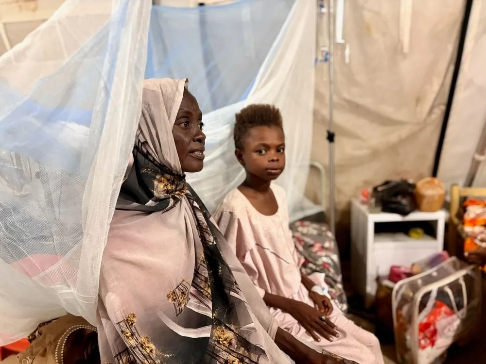 H Mariam Mohammad και o γιος της, Adam