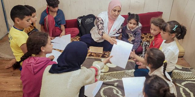 Μπορεί ένα παιδί με μία κηρομπογιά να θεραπεύσει μια κοινότητα;