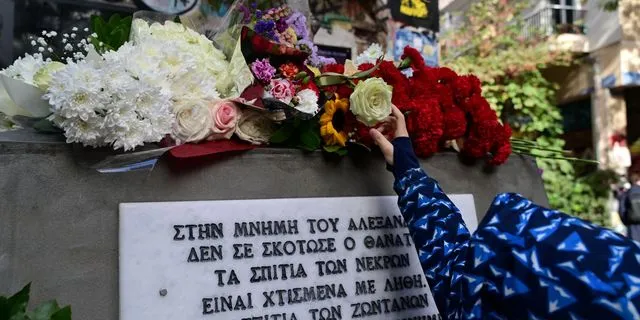 Alexandros Grigoropoulos: Citizens leave flowers at his memorial in Exarchia