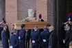 The coffin of fashion designer Valentino Garavani arrives at the St. Mary of Angels Basilica for his funeral, in Rome, Friday, Jan. 23, 2026.