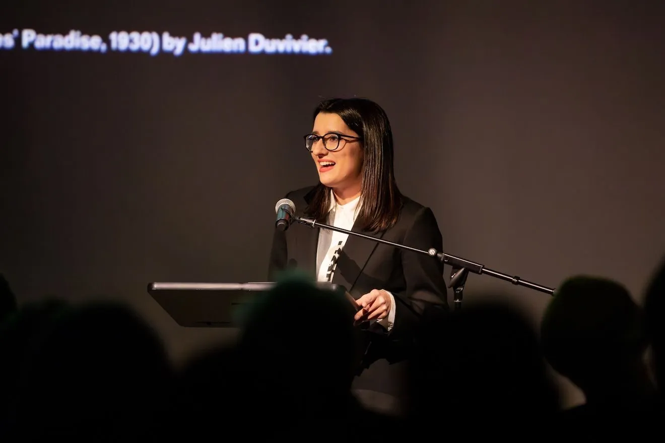 Ariana Kalliga introducing “The Wandering Spectator,” public program at Amant on Wednesday, December 3, 2025 with with Giuliana Bruno, Sophia Giovannitti, and Leah Werier. Courtesy Amant, Brooklyn, NY. Photo: Elyse Mertz.