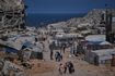 Παλαιστίνιοι στην βομβαρδισμένη Γάζα