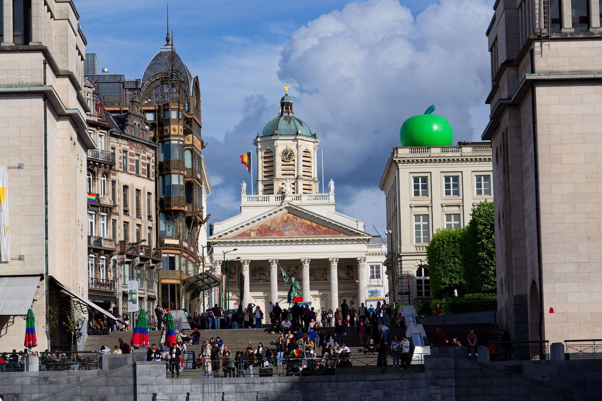 Giant green apple on the roof of Musee Magritte Museum near Mont des Arts garden and Place Royale on May 25, 2025 in Brussels, Belgium.