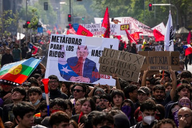 Students protest possible spending cuts and government austerity measures in Santiago, Chile, Thursday, Oct. 1, 2026